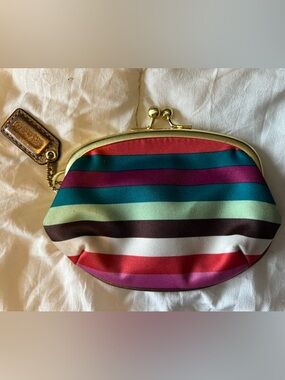 Coach Legacy Kisslock Mini Satin Coin Purse in the Rainbow Stripe Pattern
